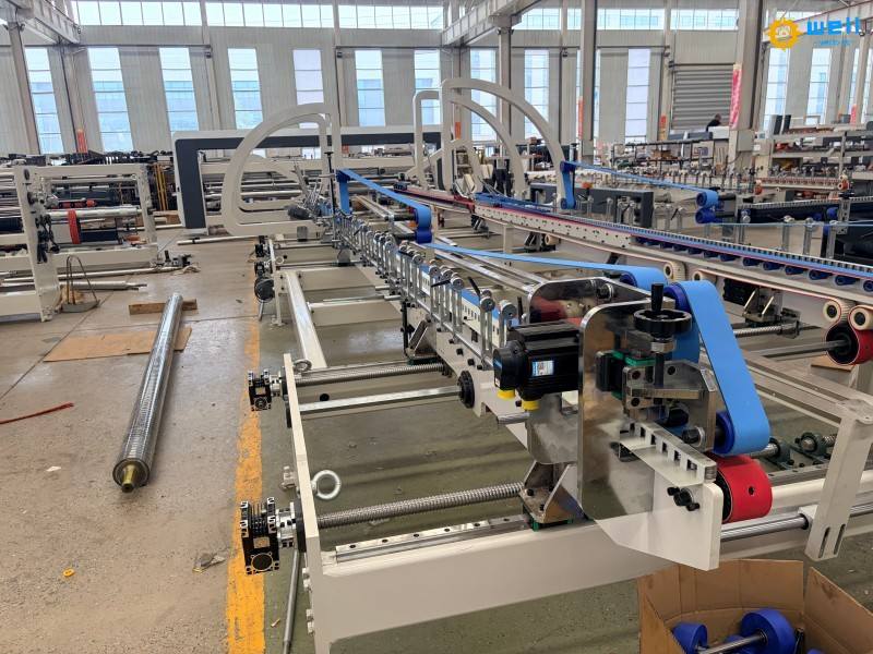 https://www.wdcartonmachine.com/automatic-folder-gluer-stitcher-machine-for-box-product/
