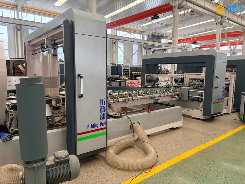 https://www.wdcartonmachine.com/automatic-folder-gluer-stitcher-machine-for-box-product/