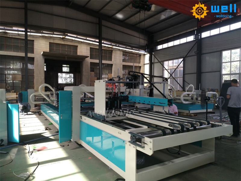 https://www.wdcartonmachine.com/automatic-corrugated-carton-pizza-box-folder-gluer-machine-product/