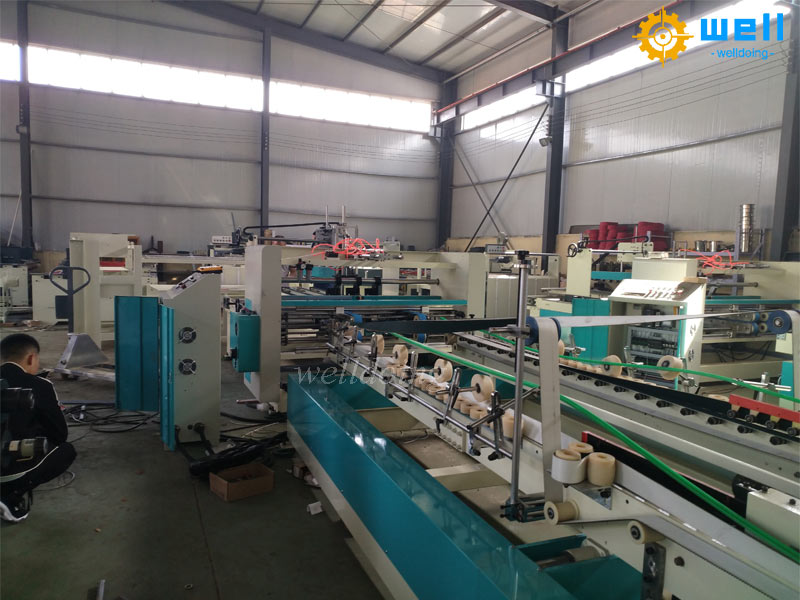 https://www.wdcartonmachine.com/automatic-corrugated-carton-pizza-box-folder-gluer-machine-product/