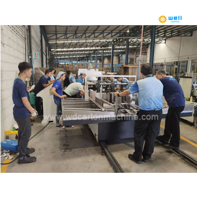 corrugated carton partition assembling machine
