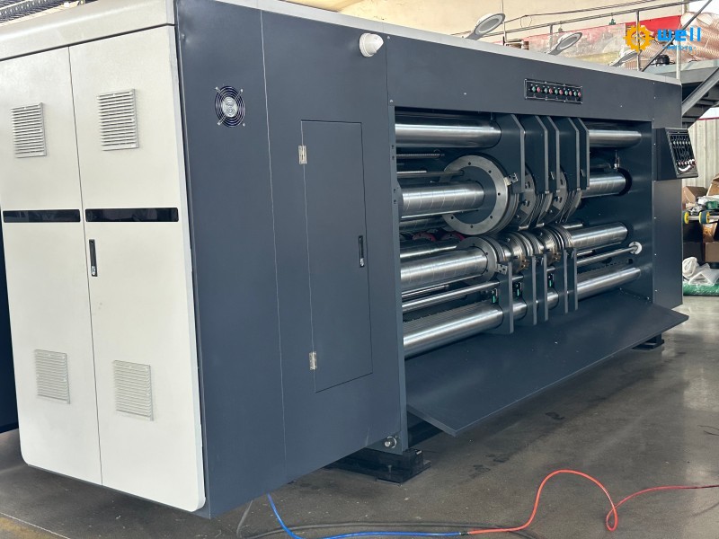 https://www.wdcartonmachine.com/corrugated-cardboard-flexo-printing-die-cutting-slotting-machine-product/