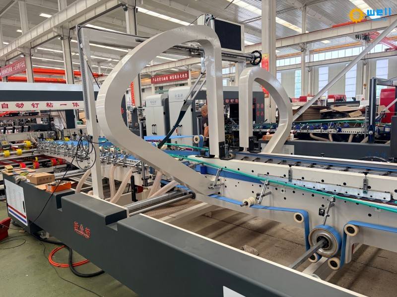 https://www.wdcartonmachine.com/automatic-carton-folding-gluing-stitching-machine-product/