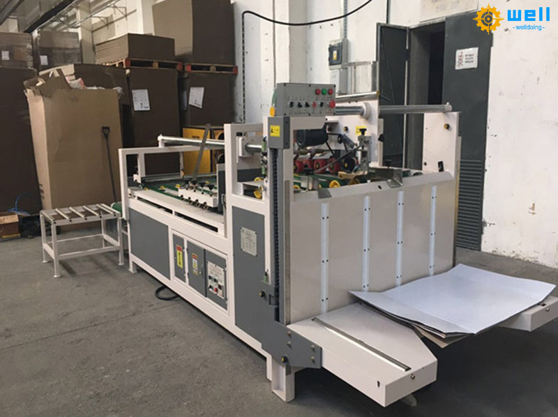 Semi-automatic carton box folding gluing machinery